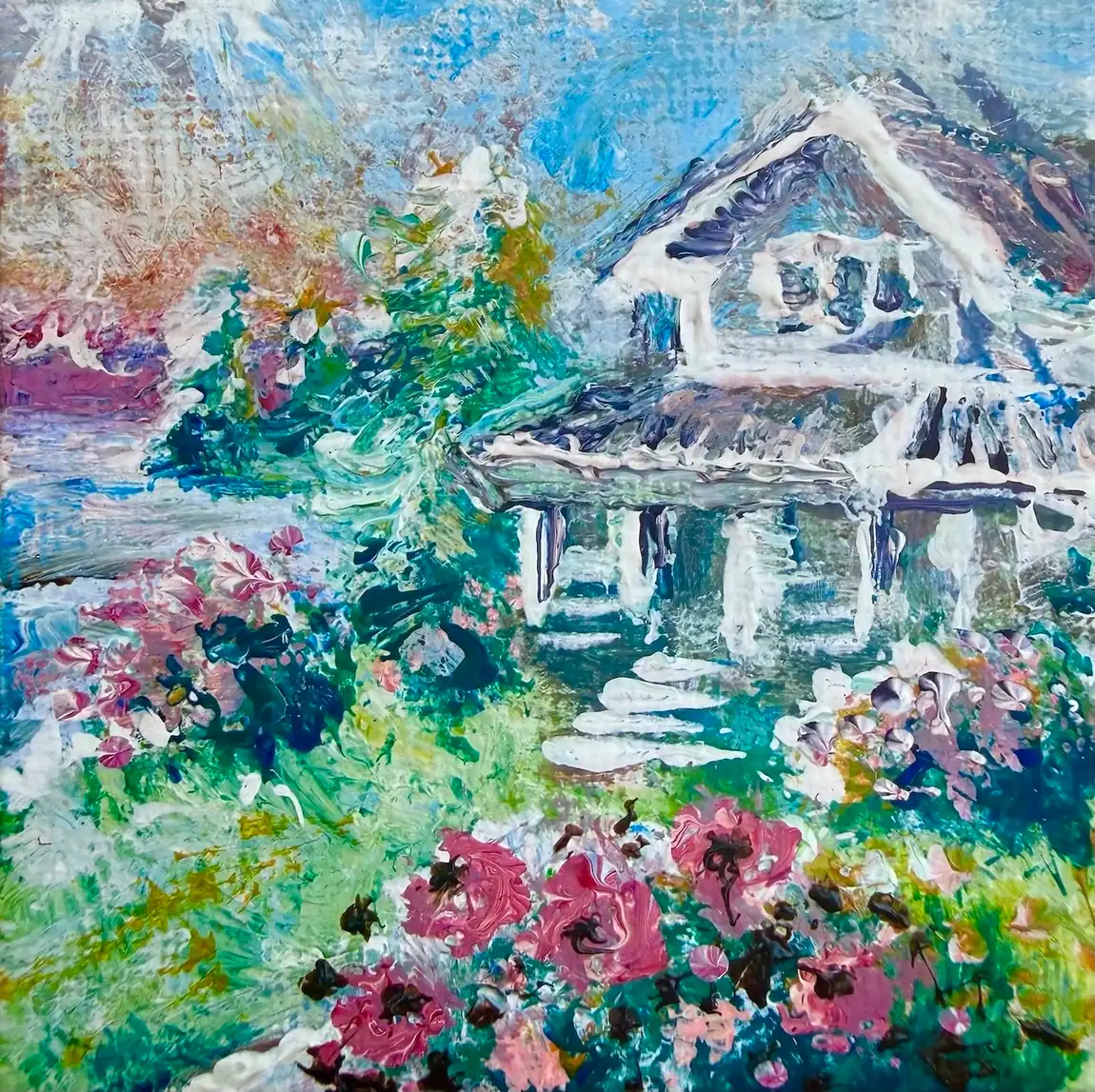 An impressionist painting of a house behind a flower garden, in a slim black moulding.